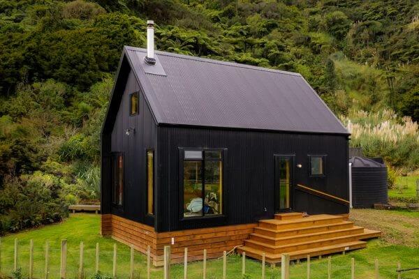 Living Big in a Tiny House - Stunning Black Off-Grid Cabin By The River