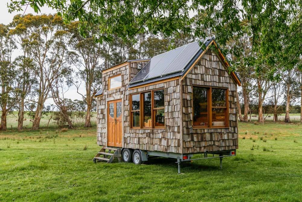 Super Affordable Off-Grid Tiny House Built With Old Fence Palings